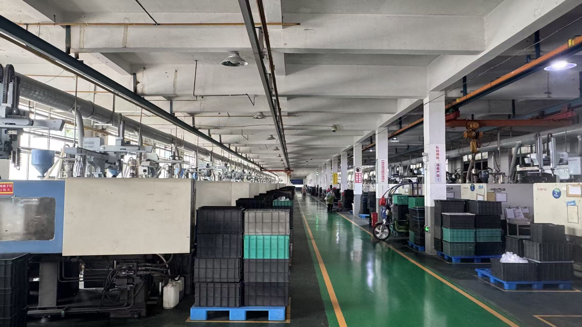 Injection molding workshop at STDPAK’s manufacturing partner facility